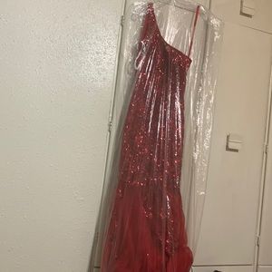 I am selling a red Beyoncé one sleeve dress for $350 if interested message me.